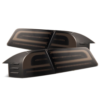 12-21 Tesla Model S LUXX-Series LED Tail Lights Black Smoke (With Black Trunk Center Piece Replacement) - view 1
